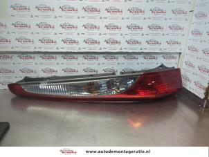 O180235 Gebruikte achterlicht links Mitsubishi Lancer