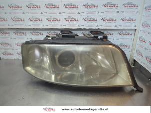 O180300 Gebruikte rechter koplamp Audi A6