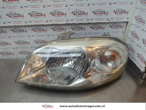 O180380 Gebruikte linker koplamp Chevrolet Aveo