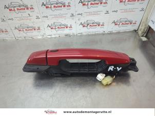 O180387 Gebruikte portiergreep 2deurs rechts Suzuki Swift