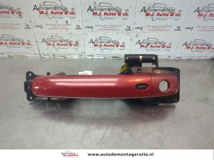 O180388 Gebruikte deurgreep 2deurs links Suzuki Swift