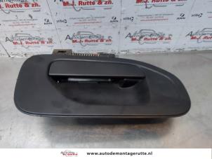 O180397 Gebruikte portiergreep 2deurs rechts Nissan NV200