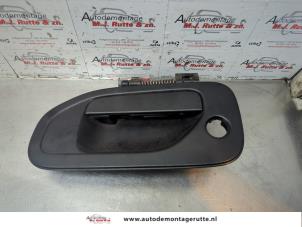 O180423 Gebruikte deurgreep 2deurs links Nissan NV200