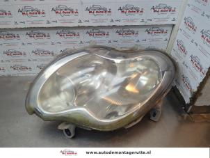 O180467 Gebruikte koplamp links Smart City Cabrio
