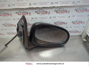 O180579 Gebruikte buitenspiegel links Nissan Almera Tino