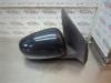 Gebruikte Buitenspiegel links Nissan Almera Tino O180579