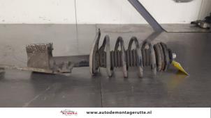 O180646 Gebruikte schokdemperpoot links-voor Peugeot Partner