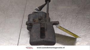 O180699 Gebruikte remklauw (tang) links-achter Audi A6