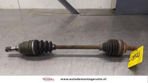 O180764 Gebruikte aandrijfas links-voor Toyota Yaris