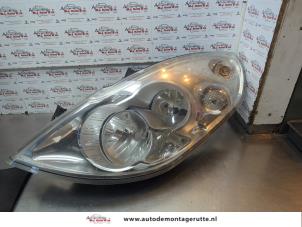 O180915 Gebruikte koplamp links Opel Movano