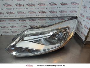 O180921 Gebruikte koplamp links Ford Focus