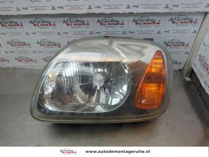 O180960 Gebruikte linker koplamp Nissan Micra