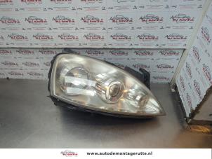 O181203 Gebruikte koplamp rechts Opel Combo