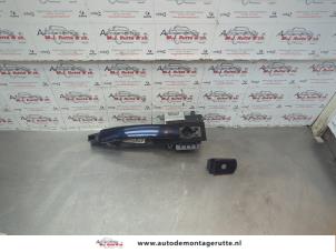 O181256 Gebruikte portiergreep 4deurs links-voor Ford Mondeo