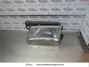 O181660 Gebruikte linker koplamp Opel Kadett