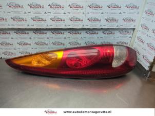 O181759 Gebruikte achterlicht links Nissan Almera Tino