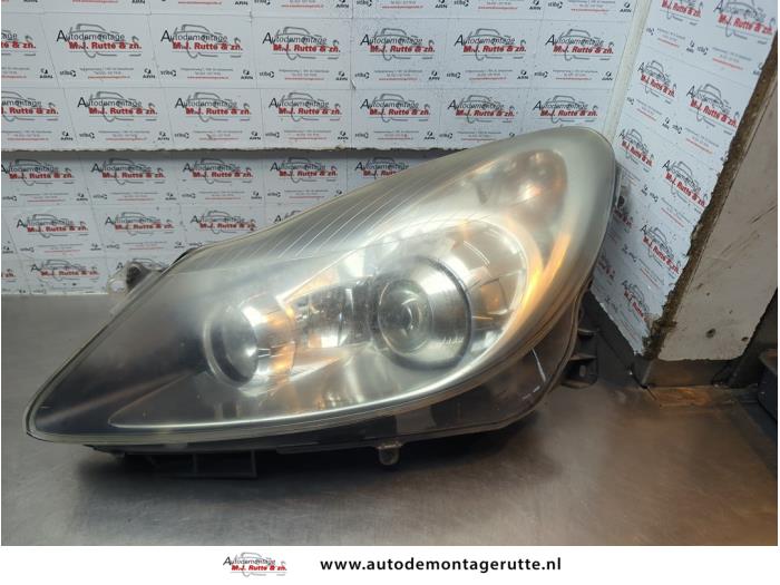 Gebruikte Koplamp links Opel Corsa O181779