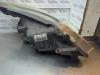 Gebruikte Koplamp links Opel Corsa O181779