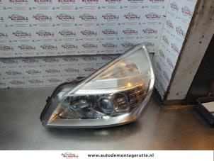 O182005 Gebruikte koplamp links Renault Espace
