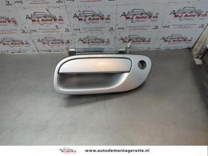 O182199 Gebruikte portiergreep 4deurs links-voor Volvo V70