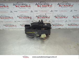 O182294 Gebruikte portierslot mechaniek 4deurs links-achter Opel Astra