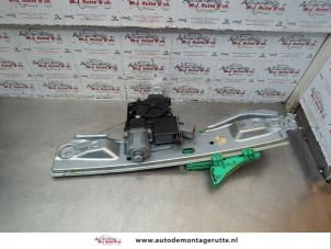 O182321 Gebruikte ruitmechaniek 4deurs links-achter Opel Astra