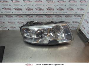 O182345 Gebruikte rechter koplamp Skoda Superb