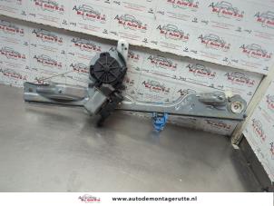 O182464 Gebruikte raammechaniek 4deurs links-voor Renault Modus