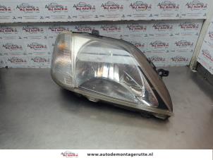 O182598 Gebruikte rechter koplamp Dacia Logan