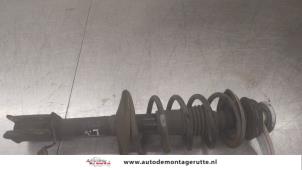 O182662 Gebruikte mac phersonpoot links-voor Dacia Sandero