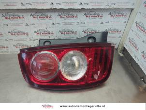 O182721 Gebruikte achterlicht links Nissan Micra