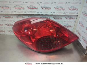 O182744 Gebruikte achterlicht links Peugeot 207