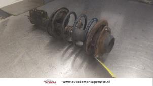 O182819 Gebruikte schokdemperpoot rechts-voor Volvo S40