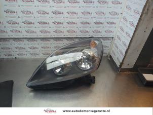 O182970 Gebruikte koplamp links Opel Zafira