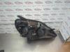 Gebruikte Koplamp links Opel Zafira O182970