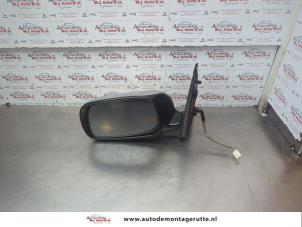 O182988 Gebruikte buitenspiegel links Daihatsu Sirion