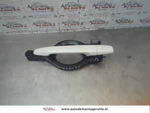 O183123 Gebruikte deurgreep 4deurs links-achter Mitsubishi Outlander