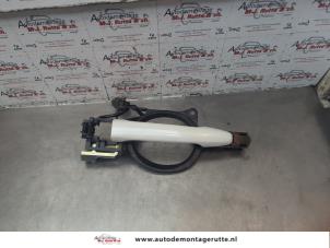 O183158 Gebruikte portiergreep 4deurs links-voor Mitsubishi Outlander