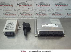 O183393 Gebruikte kontaktslot + computer BMW 3-Serie