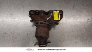 O183422 Gebruikte uitlaatspruitstuk + katalysator Mitsubishi Outlander