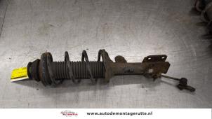 O183513 Gebruikte schokdemperpoot links-voor Suzuki Alto