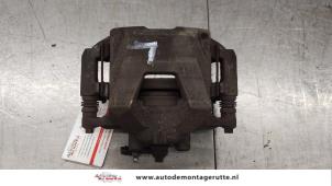 O183560 Gebruikte remklauw (tang) links-voor Opel Astra
