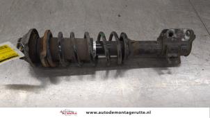 O183652 Gebruikte schokdemperpoot links-voor Suzuki Alto