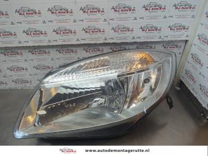 O183716 Gebruikte koplamp links Skoda Roomster