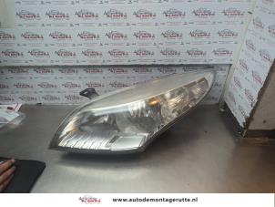 O183736 Gebruikte koplamp links Renault Megane