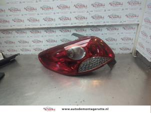 O183817 Gebruikte achterlicht links Peugeot 206 PLUS