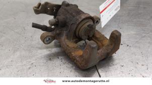 O183823 Gebruikte remklauw (tang) links-achter Volkswagen Touran