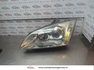 O183825 Gebruikte koplamp links Ford Focus