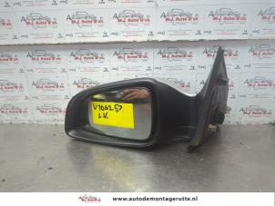O183829 Gebruikte spiegel buiten links Opel Astra