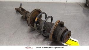 O183851 Gebruikte veerpoot links-voor Renault Twingo